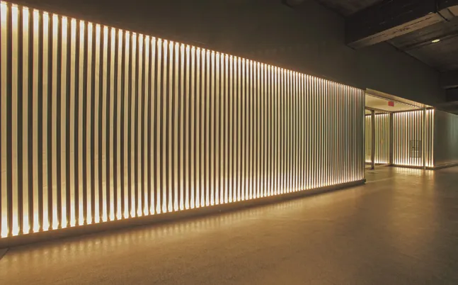 Office corridor with linear wall light
