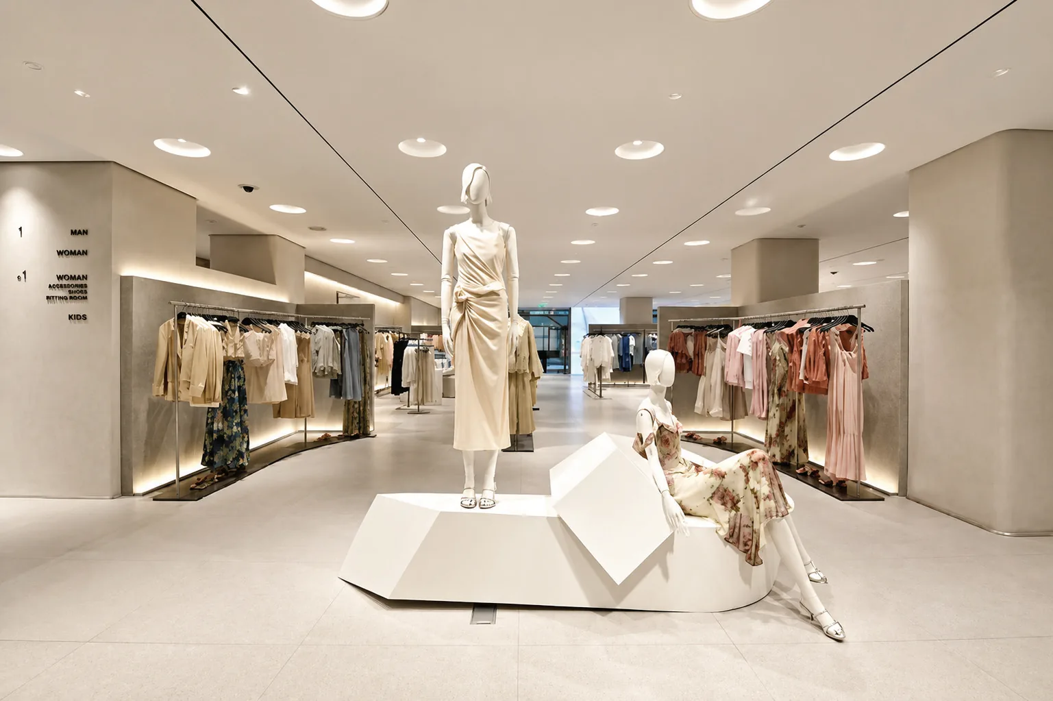Bright boutique with recessed downlights and display podium